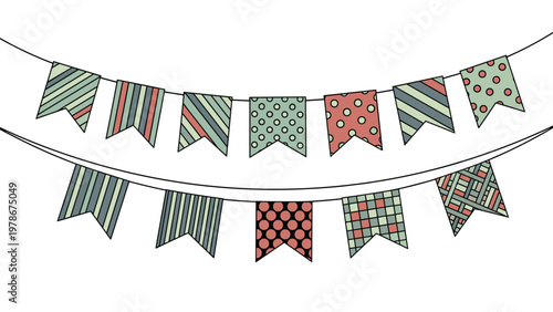 Colorful bunting flags with stripes and polka dots hang on strings to decorate festivals birthdays and special celebration events.