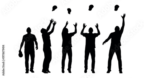 Silhouettes of people throwing hats in the air