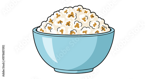 Large blue ceramic bowl is overflowing with freshly popped white popcorn with hints of yellow butter perfect for an evening movie at the cinema.