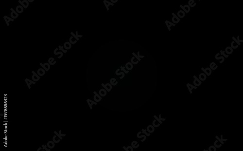 The appearance of light, the sun, dawn. Smooth appearance of light on a black background. Light in 4k resolution.