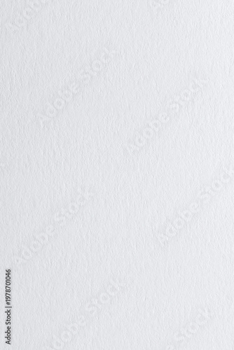 Closeup of white paper texture. Suitable for backgrounds, stationery, or concepts related to writing, printing, and office supplies.