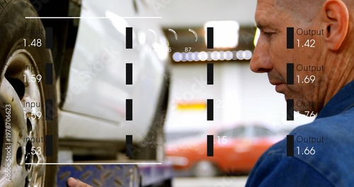 Inspecting mechanic wearing blue shirt reaching for left tire on lift, overlay readouts, copy space