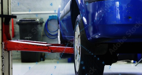 Displaying blue car rear-right rising in repair, with wheel, red hydraulic lift arm, grid overlay