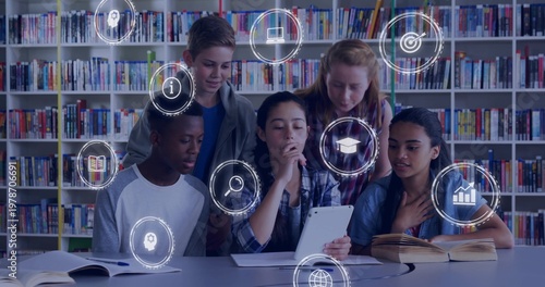 Gathering five students leaning and focusing on white tablet at library, in casual tops, HUD icons