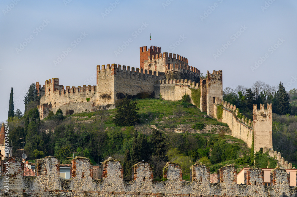 Fototapeta premium Medieval Wall Climbing the Hillside at Soave, Italy