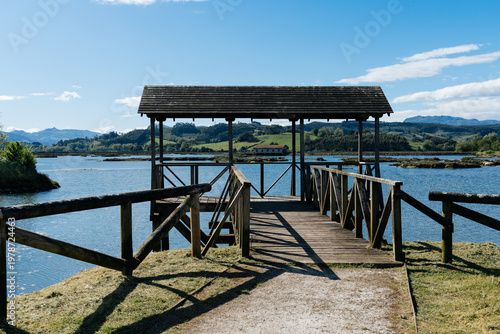 Boardwalk crossing Marismas de Escalante wetlands in Cantabria, Spain