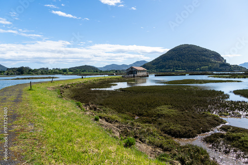 Marismas de Escalante wetlands with old tide mill