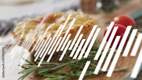 Pastry resting on board with rosemary, white bars sweeping from left, revealing and hiding for food