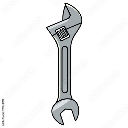 An adjustable wrench rests on a surface in a workshop environment.