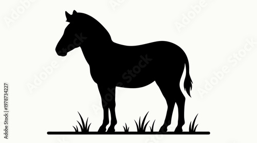 Black silhouette of a horse standing.