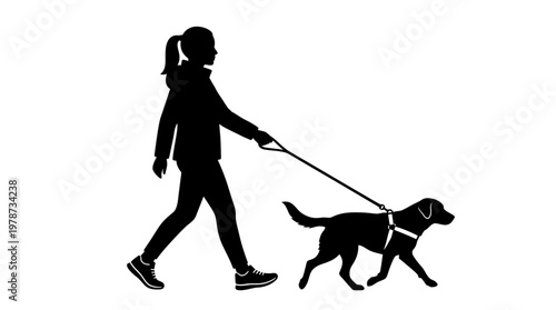 Girl walking dog on leash outside.