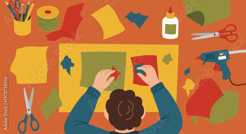 Creative person crafting colorful paper art