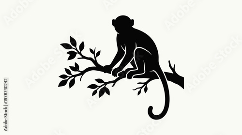 Monkey sitting on tree branch silhouette.