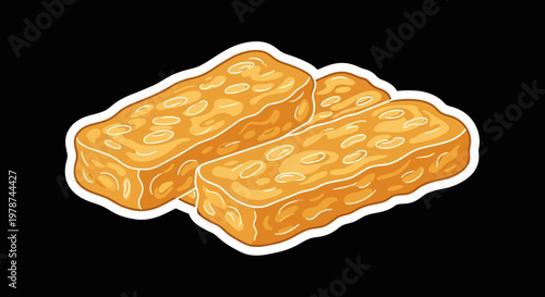 Three rectangular pieces of baked goods, possibly cookies or biscuits, with a golden-brown color and a textured surface, arranged closely together on a dark background