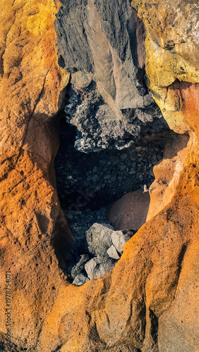 Abstract volcanic rock texture with colorful layers in La Caleta Tenerife