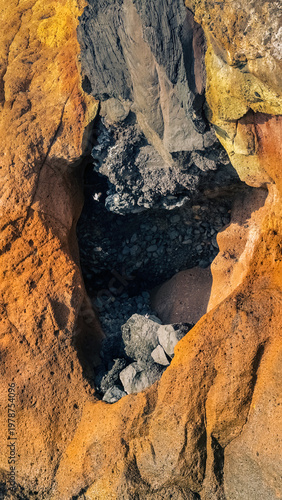 Abstract volcanic rock texture with colorful layers in La Caleta Tenerife