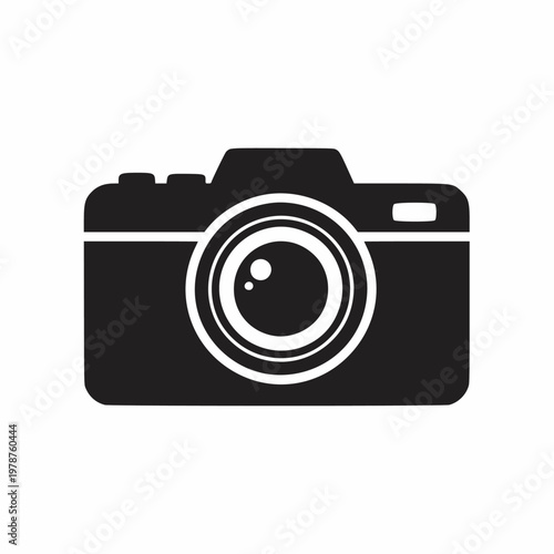 A sleek camera with a large lens and rectangular body sits on a plain background