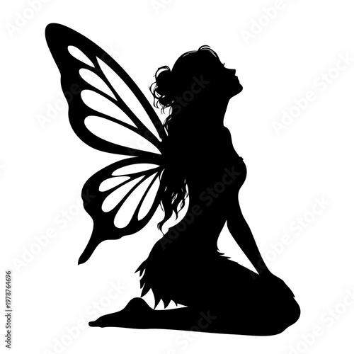 silhouette of a fairy sitting with butterfly wings