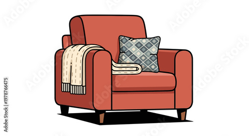 A cozy red armchair with throw blanket.