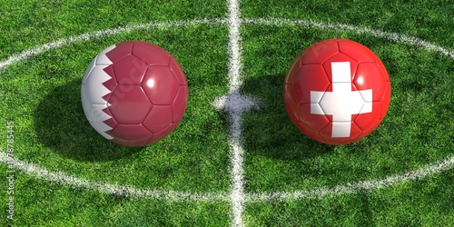 Soccer balls with Qatar and Switzerland flags on green grass football pitch