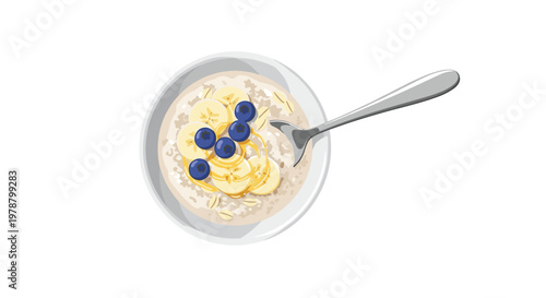 A nutritious bowl of creamy morning oatmeal topped with fresh sliced bananas and plump blueberries sits elegantly against a pristine white background space.