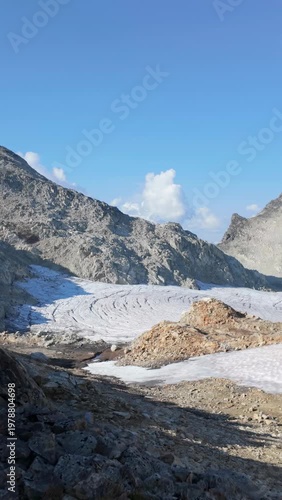 Majestic Glacier and Rocky Mountains Under a Clear Blue Sky in British Columbia, Canada
