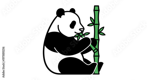 A panda eating bamboo shoots peacefully.