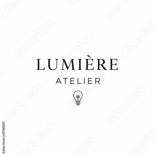 Lumiere Atelier logo with lightbulb symbol.