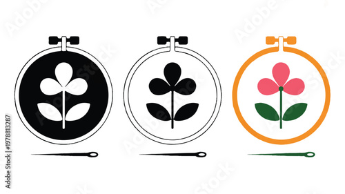 embroidery hoops with flower designs and needles