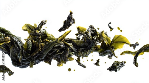Fresh Loose Tea Leaves Floating Across White Background
