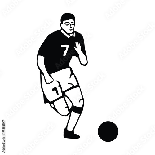 Rugby player preparing to kick the ball during a game