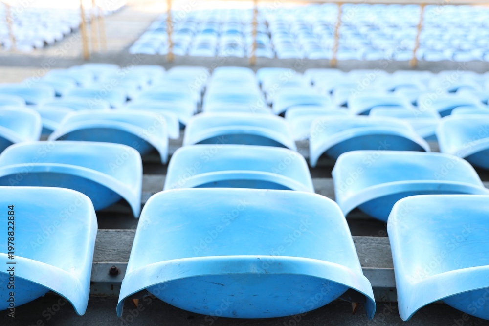 Naklejka premium blue seats in a stadium