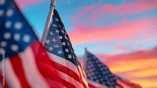 Flags Wave Under Colorful Sky at Sunset During a Public Event in America