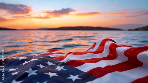 Flag on Water With Sunset View Over Horizon and Soft Colors in Sky