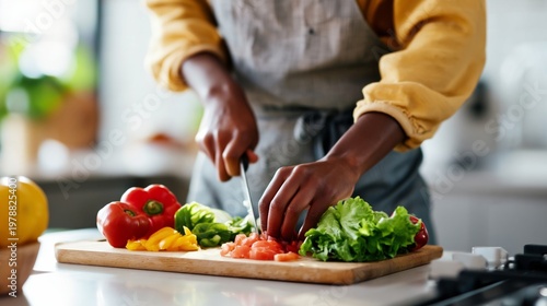 Chopping Vegetables in a Kitchen Filled With Fresh Produce and Bright Natural...