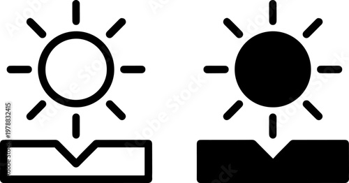 A simple black and white illustration of two sun icons shining down on rectangles
