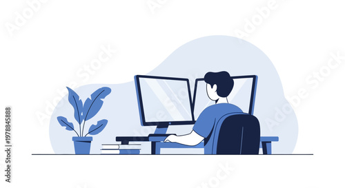 Man sitting at computer desk.