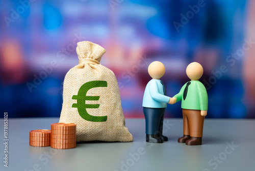 Valokuva Businessman shaking hands and euro money bag