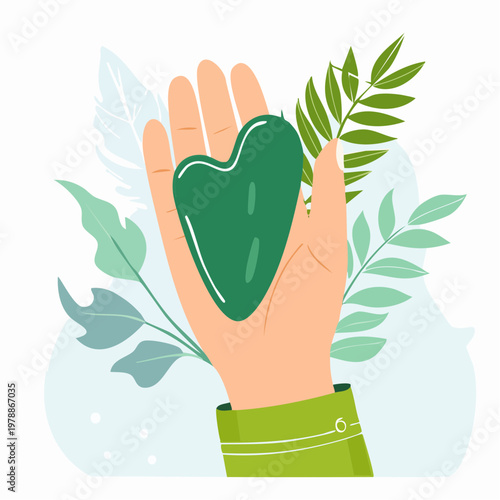 Hand holding a natural green jade Gua Sha scraping tool for facial massage, surrounded by stylized leaves and botanical elements, promoting wellness and skincare