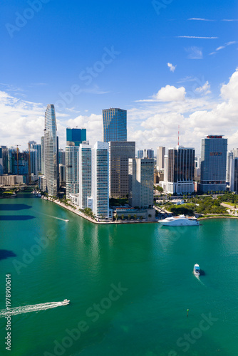Aerial Miami Brickell downtown financial district. Miami skyline with skyscrapers along Biscayne Bay. Miami cityscape with residential towers. Miami downtown skyline.