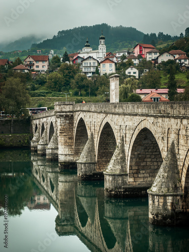 The old bridge over the Drina River (na Drini cuprija) built at the end of the 16th century in the city of Visegrad, Bosnia and Herzegovina.

