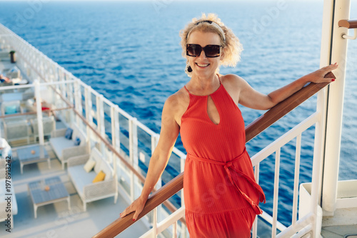 Bild auf Leinwand Beautiful happy woman on cruise ship deck