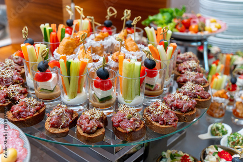 Wallpaper Mural Elegant catering buffet with beef tartare canapes Torontodigital.ca