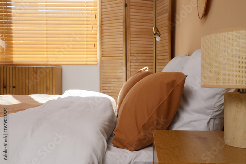 Clean linen on bed in hotel...