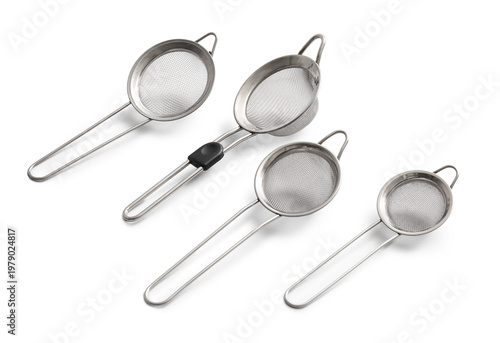 Foto Different metal sieves on light background