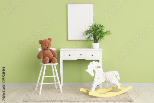 Table with plant, toys and ...