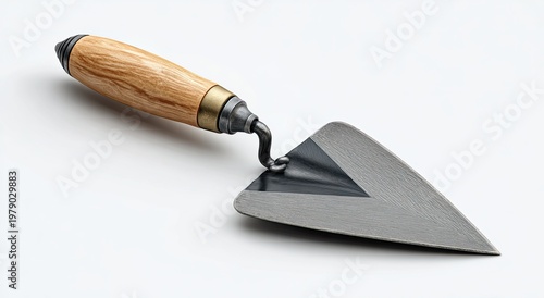 Pointed trowel with polished wood handle and steel blade, isolated on white