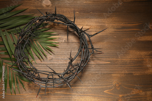 Crown of thorns and palm le...