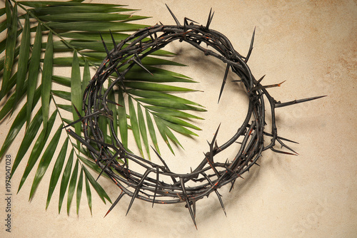 Crown of thorns and palm le...