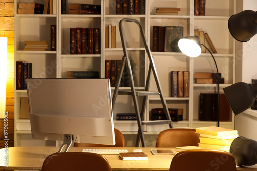 Interior of library with ta...